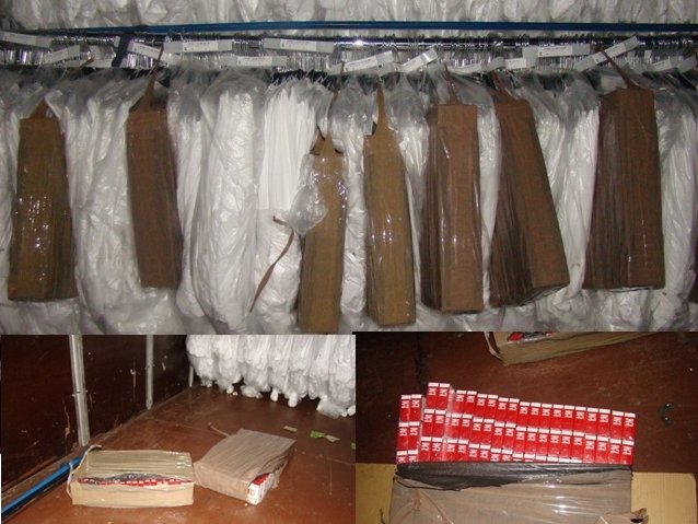 Aproximativ 3.000 pachete de ţigări ascunse pe umeraşe cu haine - FOTO