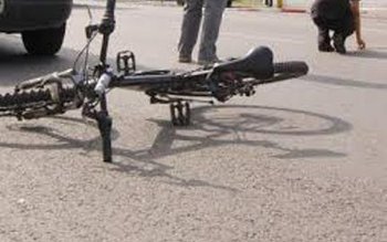 Biciclistă de 76 de ani, …