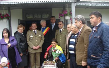 Împuşcat în gât pe front, …