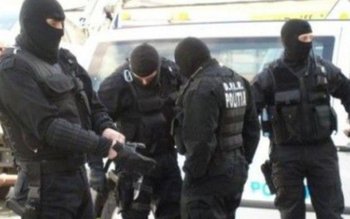 20 de percheziţii domiciliare în …