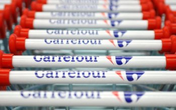 Sediile Carrefour, percheziționate. Acţiunile pe …