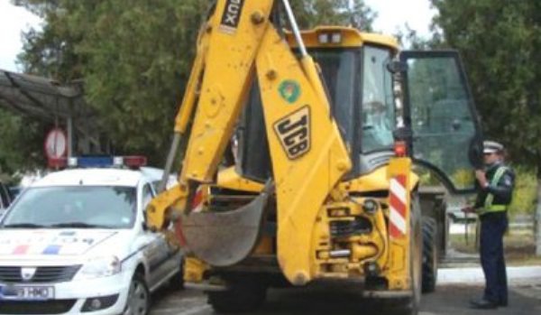 Buldoexcavator condus de un tânăr fără permis pe străzile din Botoșani