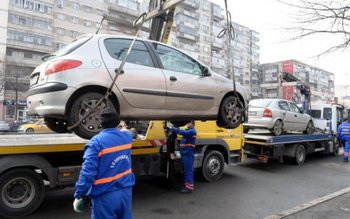 Mașinile parcate neregulamentar pot fi …