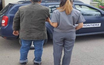 Migrant reţinut de poliţiştii de …