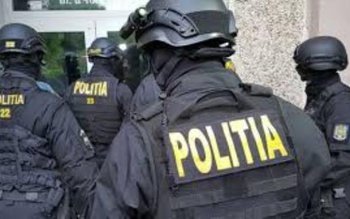 Percheziții la locuința și societatea …
