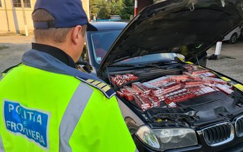 BMW blindat cu ţigări de …