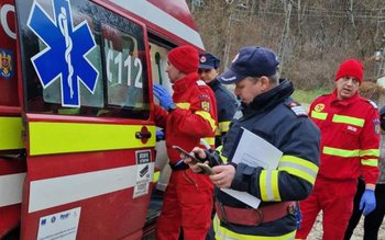 Patru bărbați care lucrau la …