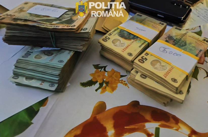 Peste 200.000 de lei ridicați de polițiști din locuința unui bărbat care organiza „tombole” ilegale